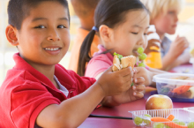 smiling child eating